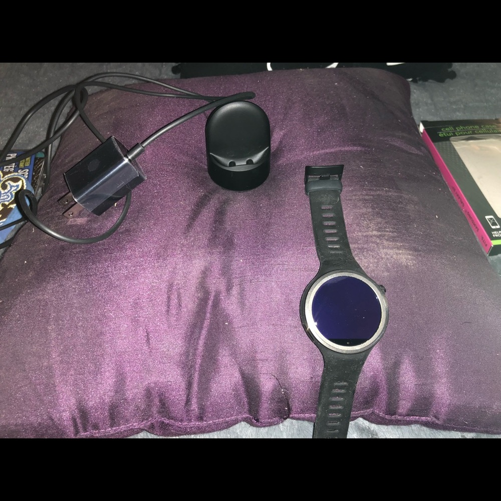 Moto 360 watch.